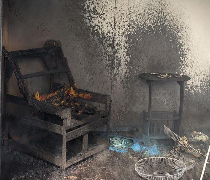 furniture in room damaged after a fire 